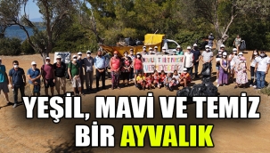 Mesut Ergin, eşi Canan Ergin ve yüz gönüllü Pazar günü mıntıka temizliğindeydi