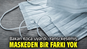 Bakan Koca uyardı: Yarısı kesilmiş maskeden bir farkı yok