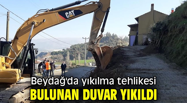 Beydağ'da yıkılma tehlikesi bulunan duvar yıkıldı