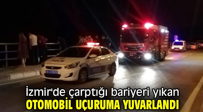 İzmir'de çarptığı bariyeri yıkan otomobil uçuruma yuvarlandı