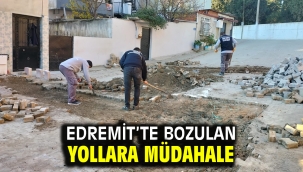 EDREMİT'TE BOZULAN YOLLARA MÜDAHALE