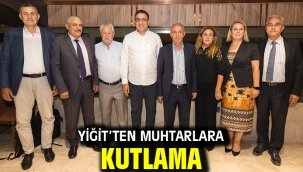 Yiğit'ten muhtarlara kutlama