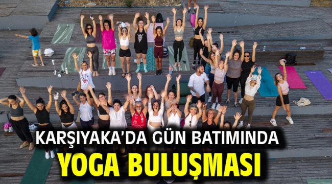 Karşıyaka'da gün batımında yoga buluşması