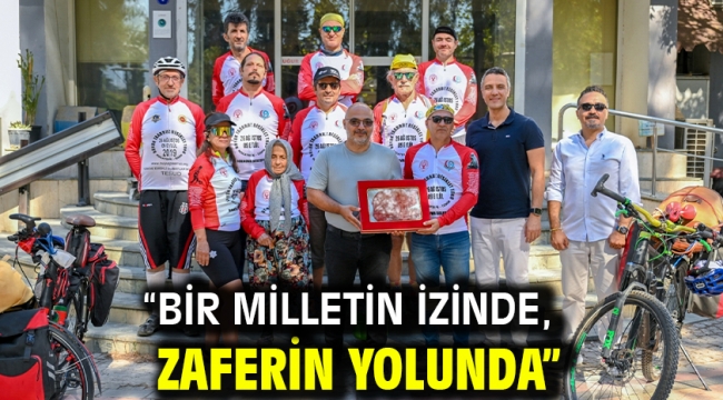 "Bir Milletin İzinde, Zaferin Yolunda"