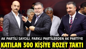 AK Partili Saygılı, farklı partilerden AK Parti'ye katılan 300 kişiye rozet taktı