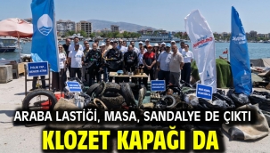 Araba lastiği, masa, sandalye de çıktı klozet kapağı da